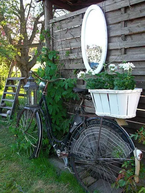 old bike turned Turn your old bike into an original garden decoration in decoration 2  with reused repurposed planter garden decoration bike 