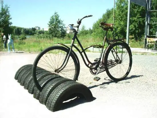 car tire bike rack 10 DIY ideas of reused tires for your garden in decoration 2  with Tires swing planter Inner tubes garden DIY decoration 