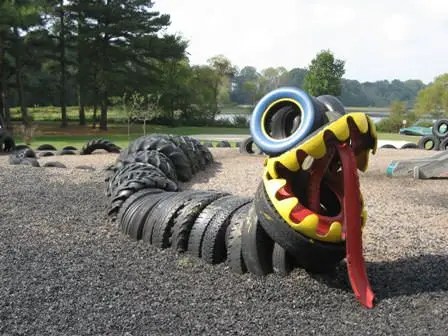 scrap tire snake 10 DIY ideas of reused tires for your garden in decoration 2  with Tires swing planter Inner tubes garden DIY decoration 