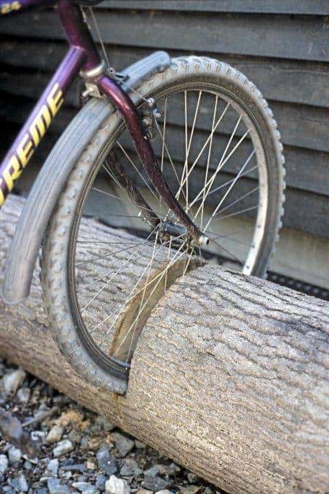 Simple Diy: Wood Trunk Into Bike Rack 23 - kidsactivities