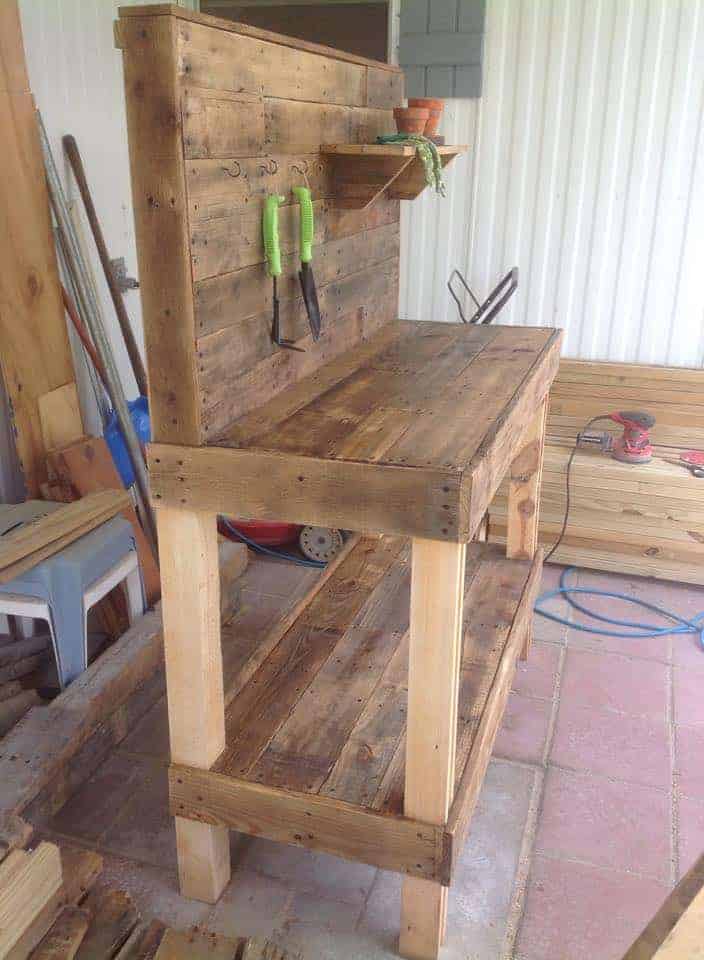 potting bench made from repurposed wooden pallets • 1001