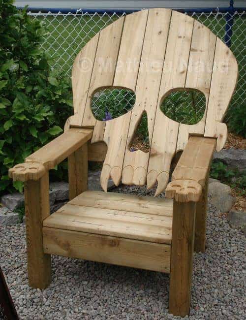 This Adirondack Chair is carved out into a skull shape on the backrest.