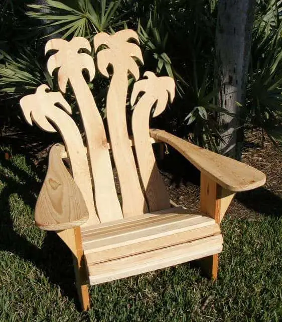 This Adirondack Chair has palm tree designs cut into the backrest.