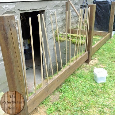 Make your Repurposed Wine Bottle Fence4