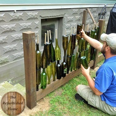 Make your Repurposed Wine Bottle Fence5