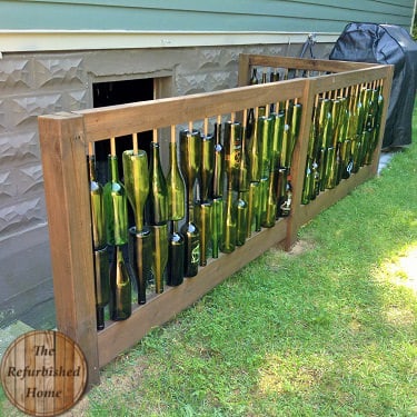 Make your Repurposed Wine Bottle Fence9