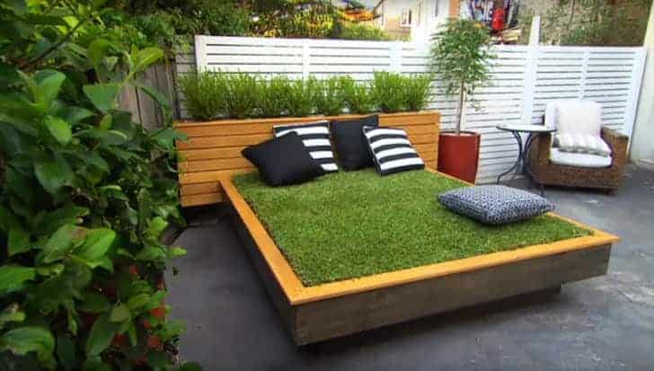 10 Outdoor Daybeds for a Lazy Afternoon include this grassy day bed!