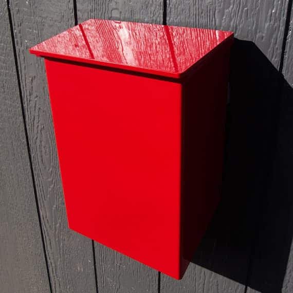 This Wall-Mounted Mailbox is powder-coated in red for years of beauty and durability.